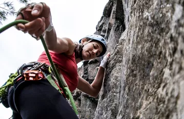 woman rock climbing